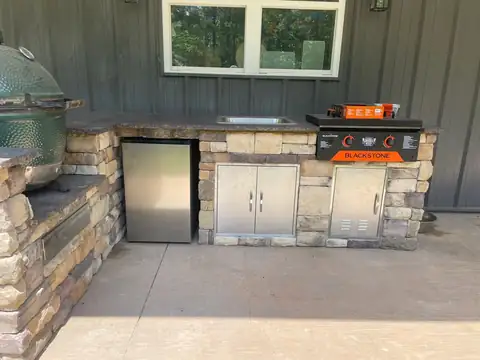 Front of the island with fridge and storage