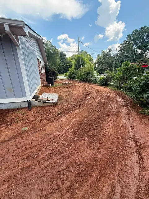 Graded side yard running out to the street