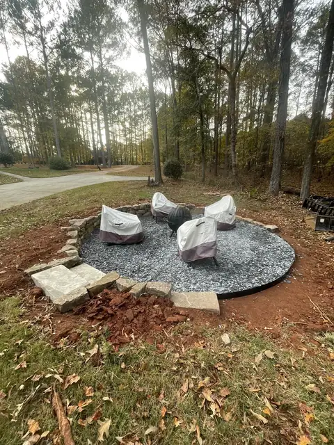 Stone border around the gravel circle