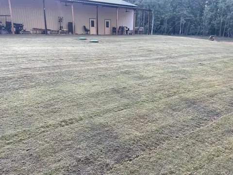 Sod laid and rolled across the open yard